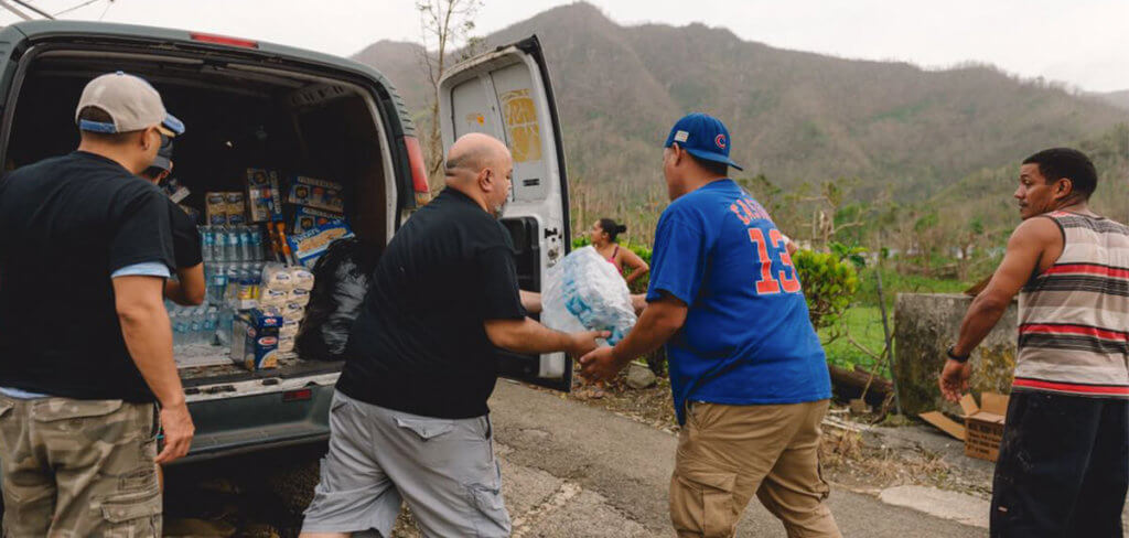 Volunteers distributing disaster relief supplies