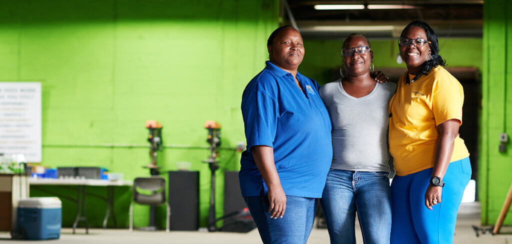 Women working in a warehouse setting