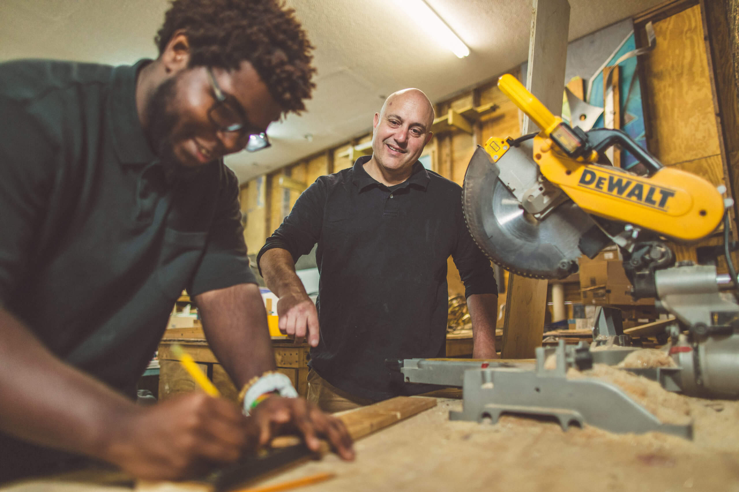 Two men working in a woodshop